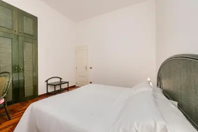 Letto o letti in una camera di 329 - Lord Nelson Chiavari, Appartamento a due passi dal Mare 2