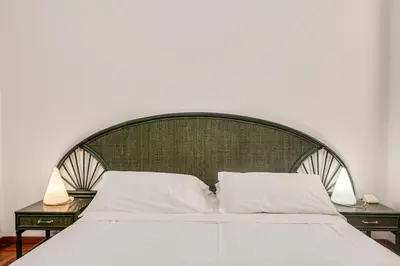 Letto o letti in una camera di 329 - Lord Nelson Chiavari, Appartamento a due passi dal Mare 2