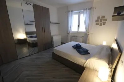 Letto o letti in una camera di Nora Home by PortofinoVacanze