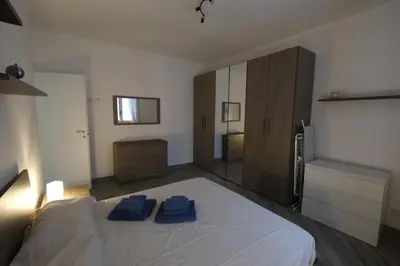 Letto o letti in una camera di Nora Home by PortofinoVacanze