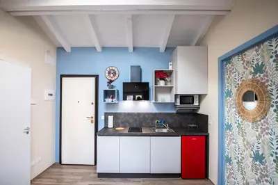 Cucina o angolo cottura di La Chimera Appartamenti