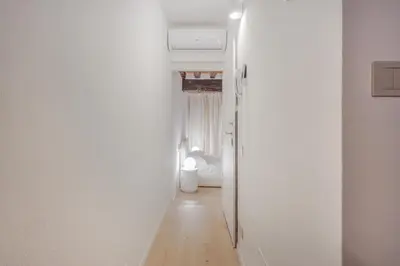 Letto o letti in una camera di Pietra di Piazza Grande - Rua Frati 34 Palace by MoVeBNB