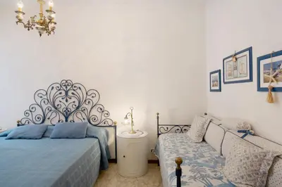 Letto o letti in una camera di Zaffiro Apartment With Garage