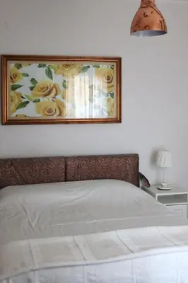 Letto o letti in una camera di Loft Claretta - Modena City