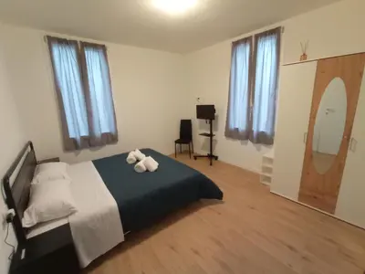 Letto o letti in una camera di Hello Parma