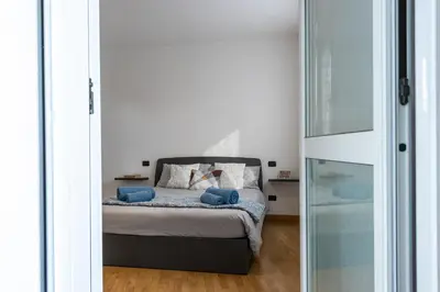 Letto o letti in una camera di Smart Apartment