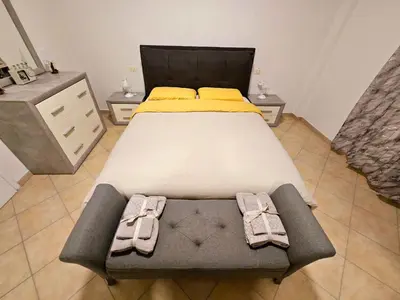 Letto o letti in una camera di Stradivarius House