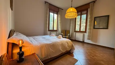 Letto o letti in una camera di Tamburini 38 Vintage Apartment Near City Center, Parking Included