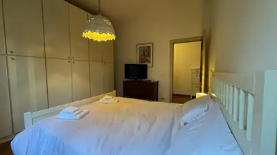 Letto o letti in una camera di Tamburini 38 Vintage Apartment Near City Center, Parking Included