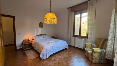 Letto o letti in una camera di Tamburini 38 Vintage Apartment Near City Center, Parking Included