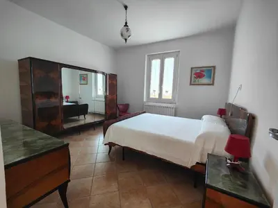 Letto o letti in una camera di Casa Il Pradone - AULLA