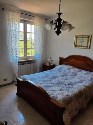 Letto o letti in una camera di L'Oliveto