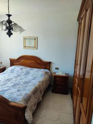 Letto o letti in una camera di L'Oliveto