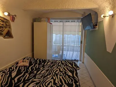 Letto o letti in una camera di Via del corso