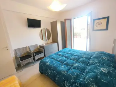 Letto o letti in una camera di Fulvio House