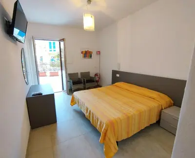Letto o letti in una camera di Fulvio House