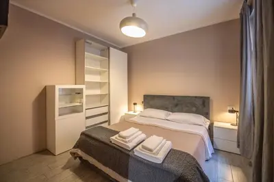 Letto o letti in una camera di Casa Leonardo