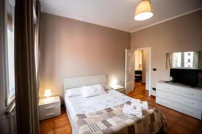 Letto o letti in una camera di Casa Letizia