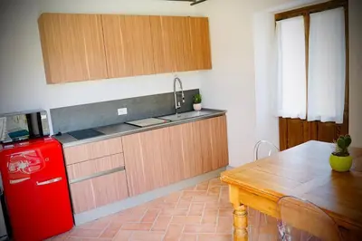 Cucina o angolo cottura di La Torre- apt up to 5 pax with shared pool