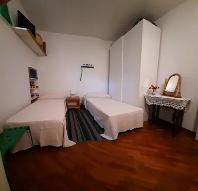 Letto o letti in una camera di La Cava