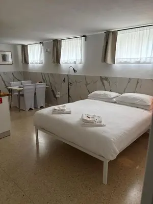 Letto o letti in una camera di da Melina