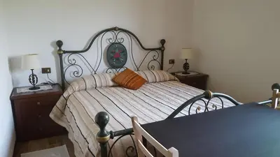 Letto o letti in una camera di B&B Monteguzzo