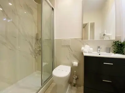 Bagno di Apartment Charmante Wohnung mit Meerblick und Garage by Interhome