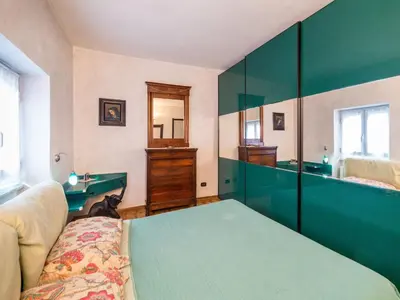 Letto o letti in una camera di Holiday Home 5 Terre Free Shuttle Villa Maremontii mit Pool by Interhome
