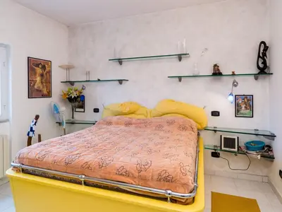 Letto o letti in una camera di Holiday Home 5 Terre Free Shuttle Villa Maremontii mit Pool by Interhome