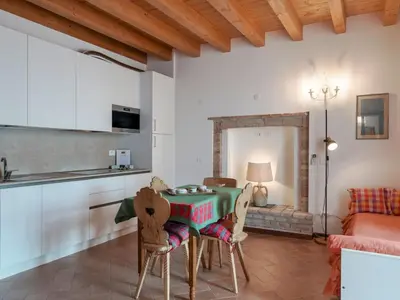 Cucina o angolo cottura di Apartment Zweizimmerwohnung mit zwei Einzelbetten und Schlafsofa by Interhome