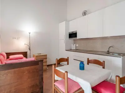 Letto o letti in una camera di Apartment Wohnung mit Einzelbetten und Schlafsofa by Interhome