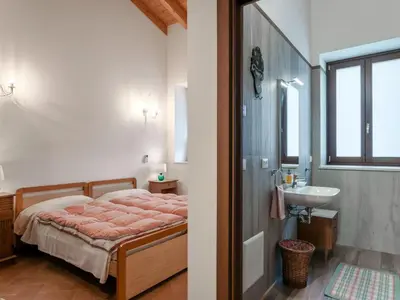 Letto o letti in una camera di Apartment Wohnung mit Einzelbetten und Schlafsofa by Interhome