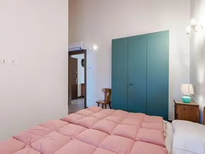 Letto o letti in una camera di Apartment Wohnung mit Einzelbetten und Schlafsofa by Interhome