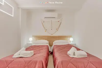 Letto o letti in una camera di Cà Maccaja, TerreMarine