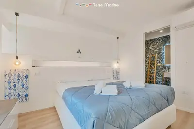 Letto o letti in una camera di Cà Maccaja, TerreMarine