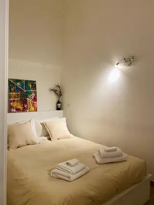 Letto o letti in una camera di Casa Parma