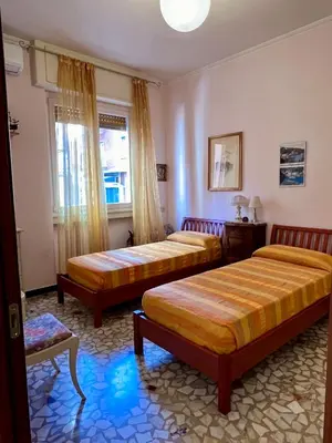 Letto o letti in una camera di Casa Pierina