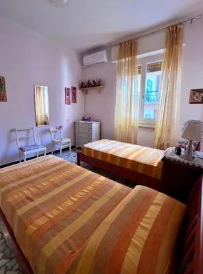 Letto o letti in una camera di Casa Pierina
