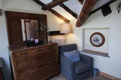Area soggiorno di Guest House Dell'Affresco