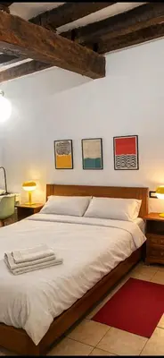 Letto o letti in una camera di Dimora Pia
