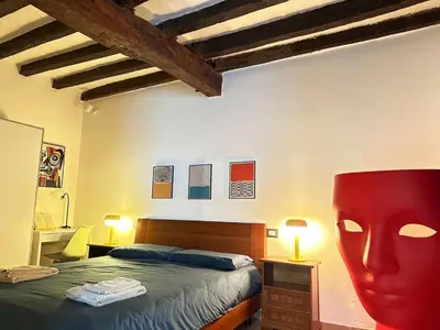 Letto o letti in una camera di Dimora Pia