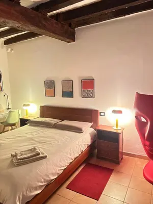 Letto o letti in una camera di Dimora Pia