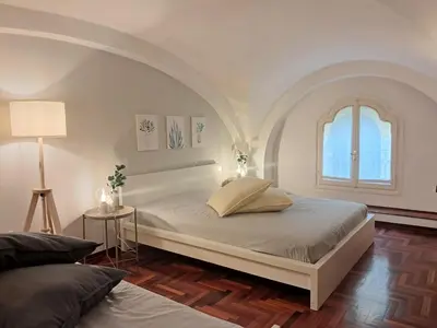 Letto o letti in una camera di Appartamento Petrarca