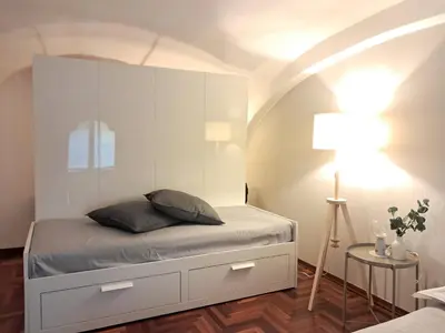 Letto o letti in una camera di Appartamento Petrarca
