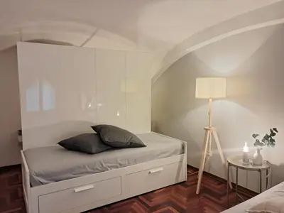 Letto o letti in una camera di Appartamento Petrarca