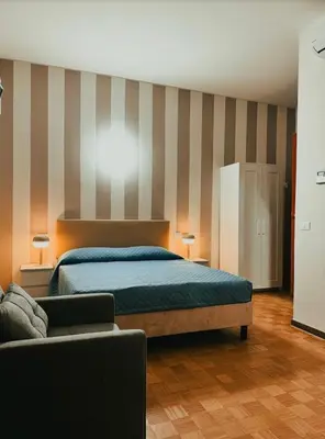 Letto o letti in una camera di Foresteria Liros 2