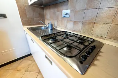 Cucina o angolo cottura di 334 - Residence Montebello Bilocale B, Relax nel verde con Piscina