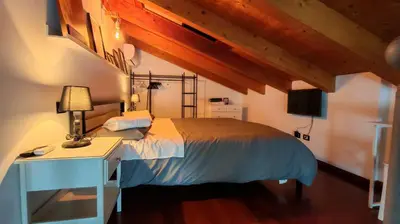 Letto o letti in una camera di Parma Loft House