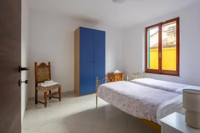 Letto o letti in una camera di Appartamento Roberto-4 beds,AC