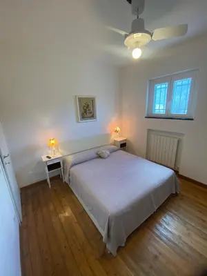 Letto o letti in una camera di Piccola Casa Liguria Un'oasi al sole